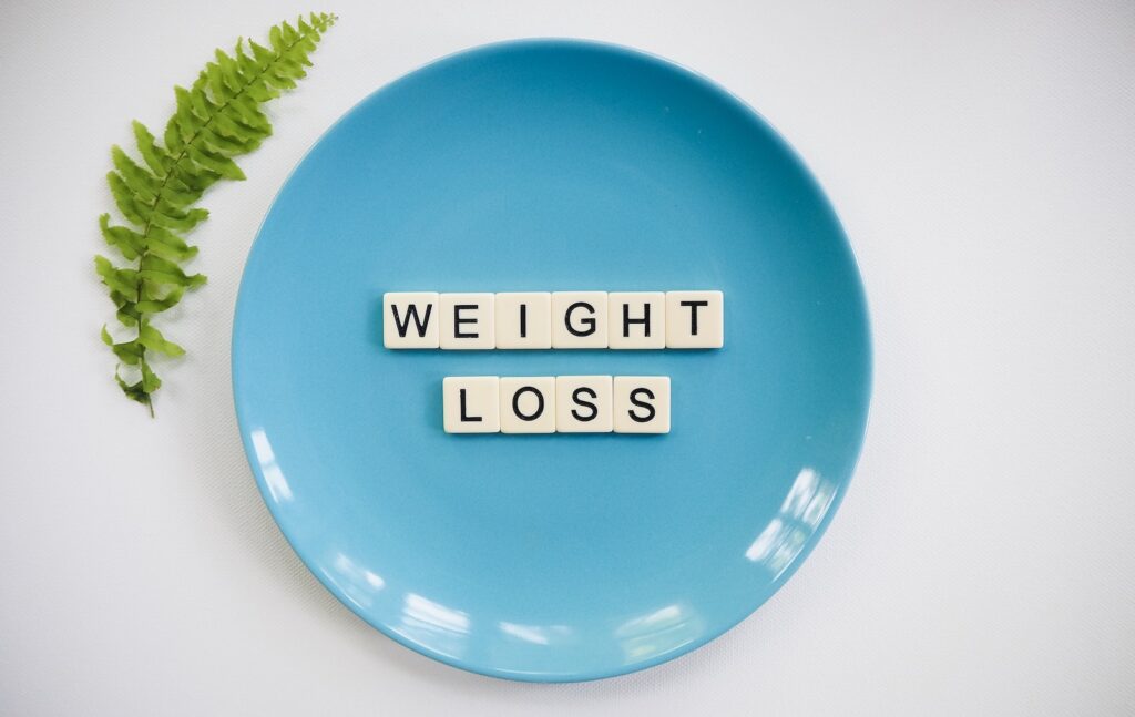 Weight Loss - Scrabble Pieces On A Plate